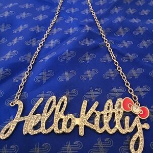 Sanrio Hello Kitty Necklace with Red Bow and Silver Chain